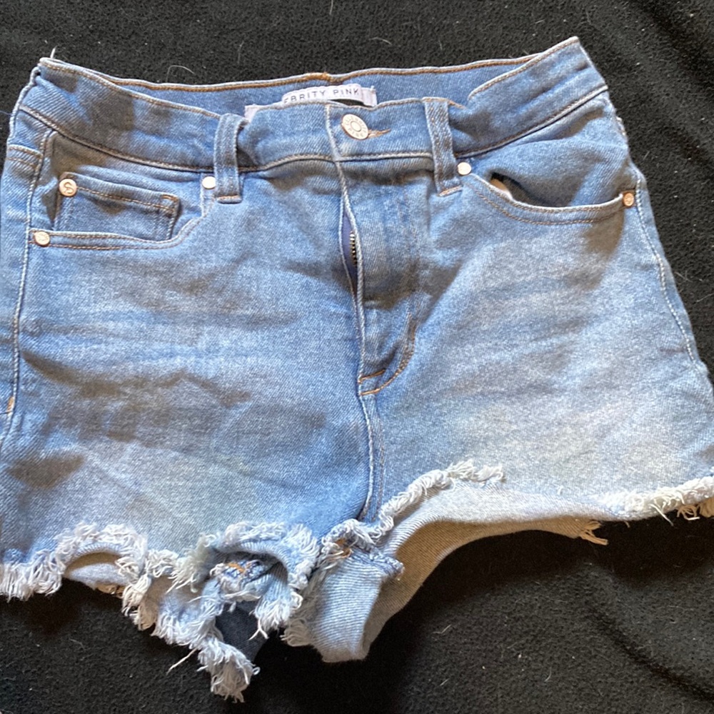 Blue Jean shorts distressed.